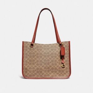 Brand new unopened and unused coach bag. ( New Release)